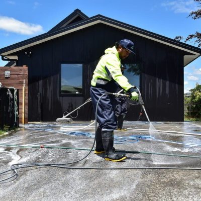 Professional cleaning team smiling outdoor